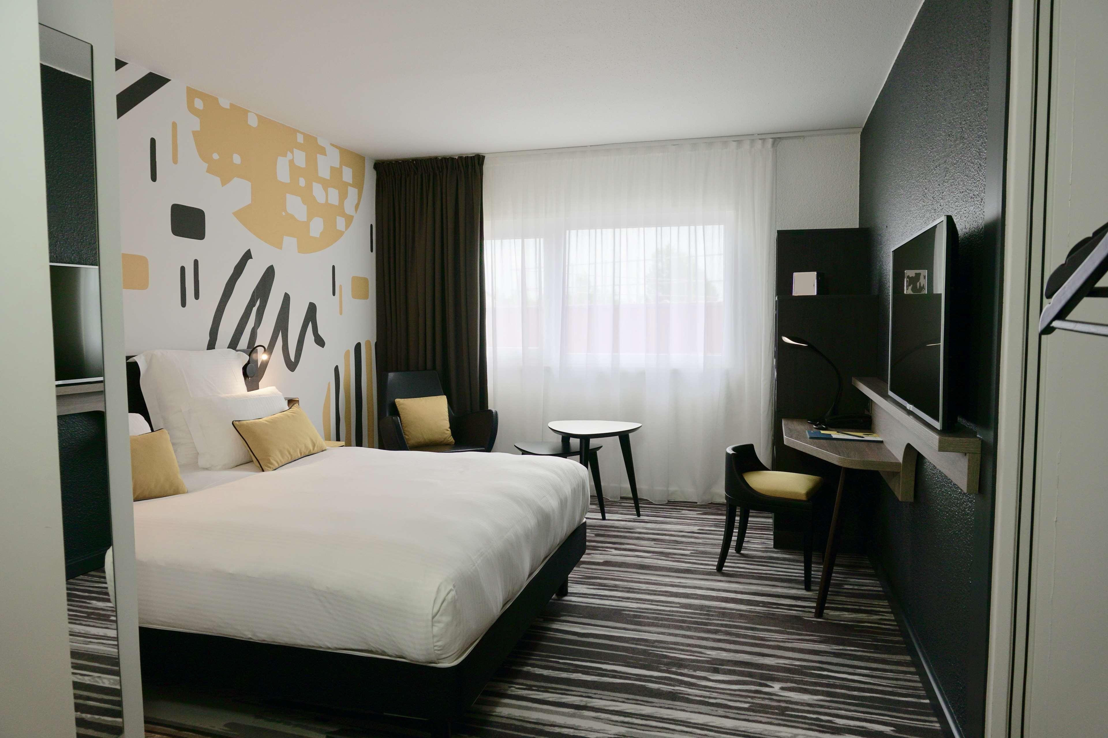 Hotel Golden Tulip Roissy Saint Witz Esterno foto